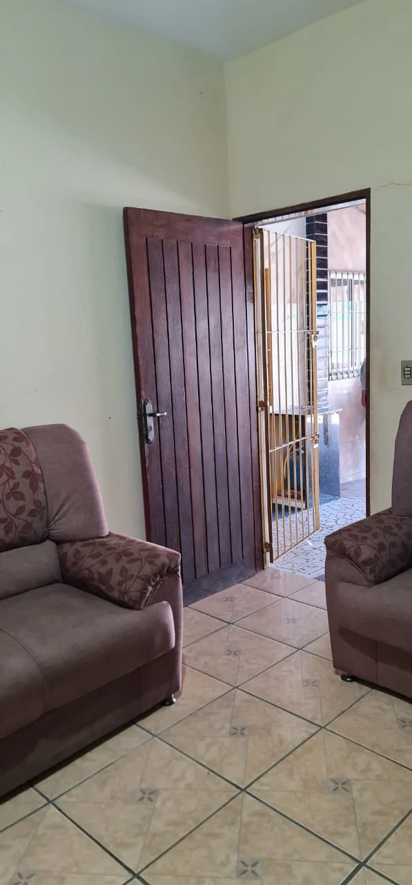 Sala de estar da casa com sofás